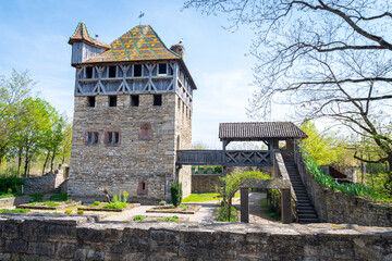 Traditional old alsatian forte or castle in the Ecomuseum Alsace in city of Mulhouse, Alsace, France