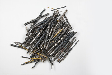 A pile of jumbled twist drills. Chaos or order which is better? Everything is possible in chaos, it...