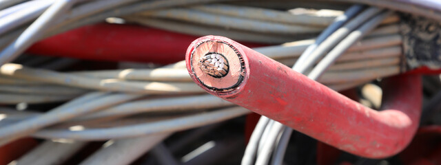 Disused Red copper electrical cable for high voltage electricity in the recycling facility for the...
