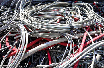 heap of insulated cables for the transport of low voltage current in the landfill for the recovery...