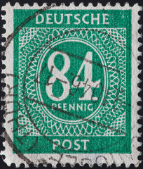 GERMANY - CIRCA 1946: a postage stamp from GERMANY, showing a permanent stamp numerals in oval with...