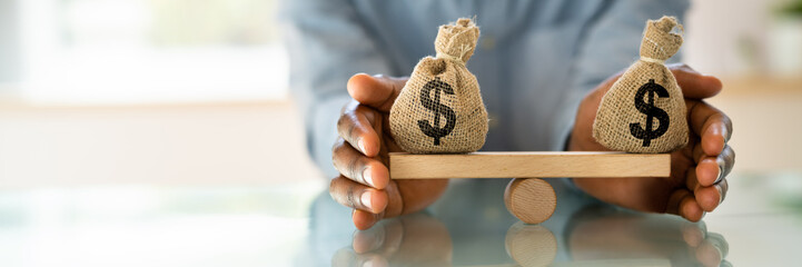 Money Balance On Scales