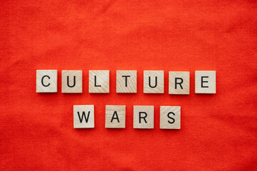 Culture wars concept with tile lettering.