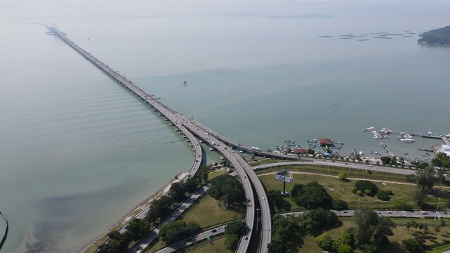 defaultGeorgetown, Penang Malaysia - May 18, 2022: The Majestic Penang Bridge, the iconic long bridge connecting Georgetown of Penang Island to the Mainland city of Butterworth.
