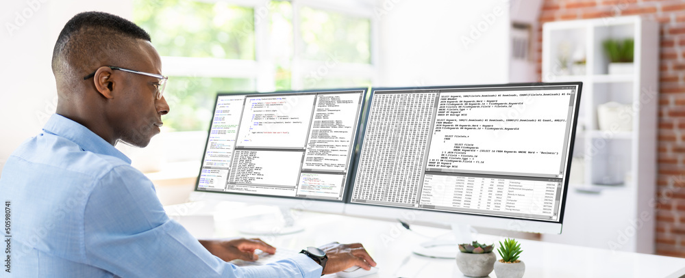 Poster African American Coder Using Computer At Desk