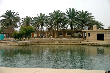 Buildings around a lake on Camp Slayer, a Forward Operating Base in Baghdad, Iraq