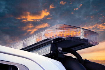 Vehicle with flashing yellow light in action