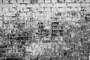 Brick wall painted with paint surface for background. Brick wall. Close-up. Old wall.