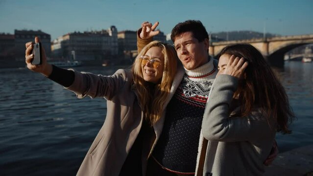 Positive young people traveling in Europe recording selfie video for social network makes crazy faces, express various feelings and emotions, Happiness Road Trip Adventure, Slow Motion