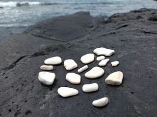 Fototapeta na wymiar Small pebbles from the sea from the island
