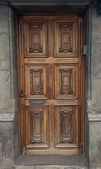 Fototapeta na wymiar Old shabby wooden door photo from Terceira island