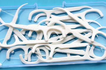 Plastic white dental floss picks