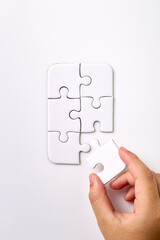 White puzzle on the table