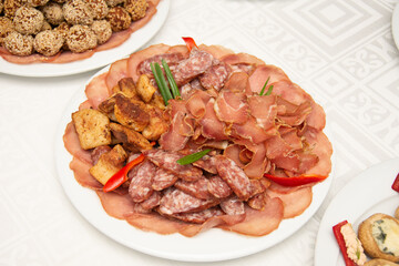 platter with game meat, peppers, salami, jumari and smoked meat