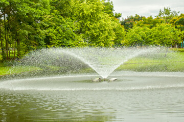 Fountain in Chatuchak Park pond, Bangkok, Thailand