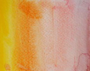 Watercolor stroke and spray on white paper , Abstract background by hand drawn yellow with orange and red color liquid drip