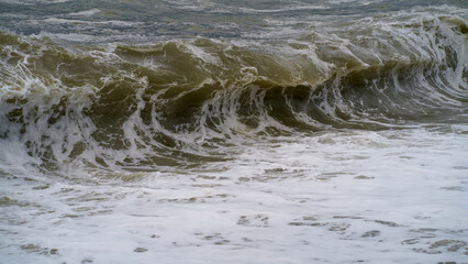 Sea water with air swirls in Sea creating blue and white patterns
