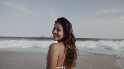 Fototapeta na wymiar Latin young girl, famous beach Rio de Janeiro, Brazil. Latin summer vacation holiday.