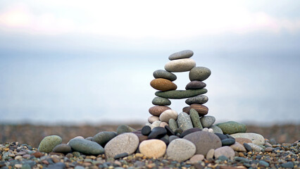 zen stone. Refreshing nature sky background with stacked nature color stones.