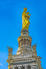 Fototapeta premium Golden Mary Statue Notre Dame de la Garde Marseille France