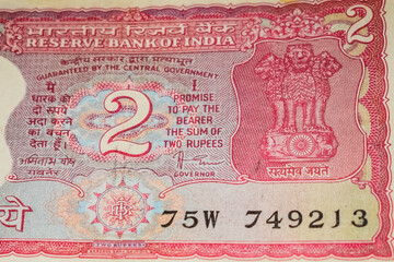 Old Two Rupee notes combined on the table, India money on the rotating table. Old Indian Currency notes on a rotating table, Indian Currency on the table