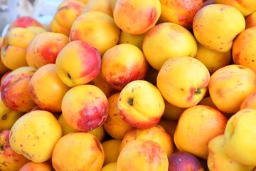 Ripe Nectarines (Latin Prunus persica) of the new harvest are sold at the bazaar 