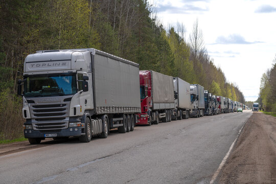 PSKOV REGION, RUSSIA - MAY 08, 2022: European trucks are queuing to cross the Russian-Estonian border