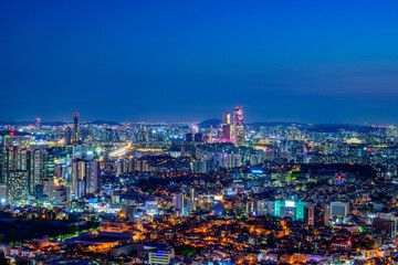 Fototapeta na wymiar Seoul city night view taken from Namsan Mountain in Seoul, South Korea at night time