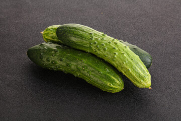 Fersh juicy green cucumbers heap