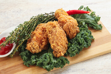 Crispy chicken wings with tomato ketchup