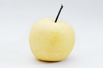 Pear fruit (Pyrus) - Close up detail Pear fruit on white background. Yellow pear fruit isolated