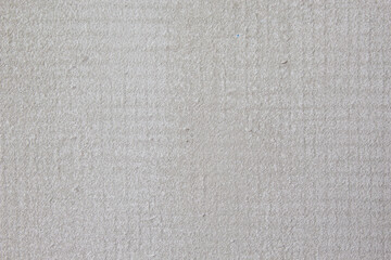 Fototapeta na wymiar Grey cement plaster on fiber mesh texture