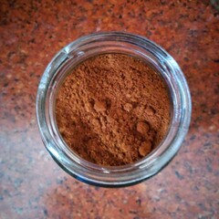 Obraz na płótnie Canvas cocoa powder in a bowl