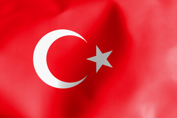Turkish flag. The flag of Turkey is a spectacular composition of a white star and crescent on a bright red background.