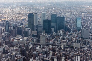Fototapeta premium 名古屋市中区丸の内上空から名古屋駅方向を空撮