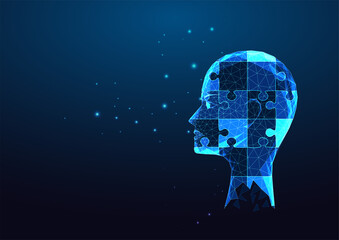 Futuristic mental health, psychology concept with glowing human head and jigsaw puzzles on blue 