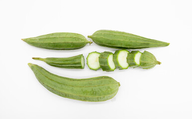 Fresh Angled loofah slice over on white background