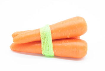 selective focus, Fresh Carrot packing over on white background, Clipping path.