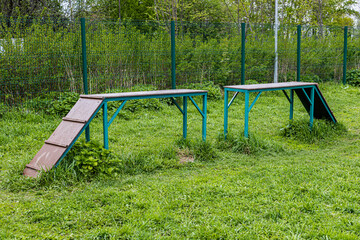 obstacle course consisting of projectiles on the ground for dog training