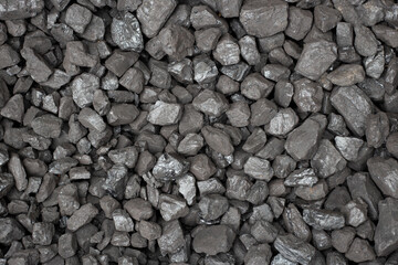 coal heap, zenithal view. pollutant energies. fuel for industry.