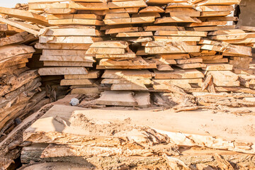 Warehouse wood closeup. At the sawmill plant wooden blanks for furniture and construction.