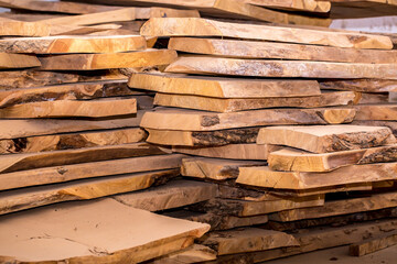 Warehouse wood closeup. At the sawmill plant wooden blanks for furniture and construction.