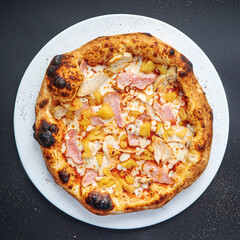 pizza on the black background, top view