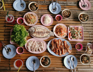 Thail meal table, seafood, 
boat noodle, top view 