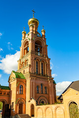 Christian church cross in high steeple tower for prayer