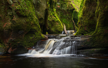 The devils pulpit , Scotland , Waterfall and rock formation . 