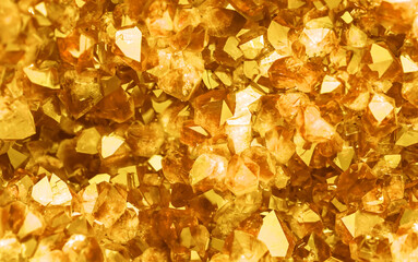 Golden crystal mineral stone. Gems. Mineral crystals in the natural environment. Texture of...