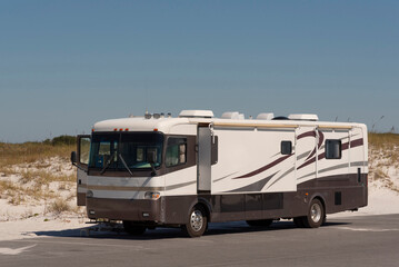 Pensicola Beach, Florida, USA. 2022.  Recreational vehicle parked up close to the beach in Pensicola, Florida, USA.