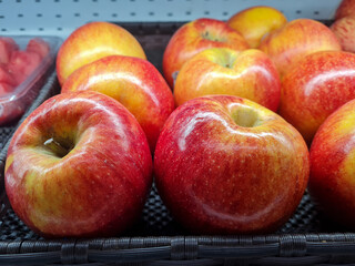 pile of red apples in the market