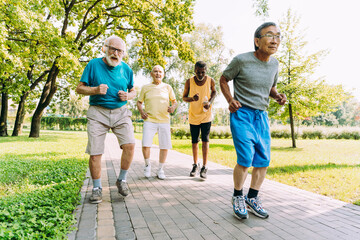 group of senior friends training at the park